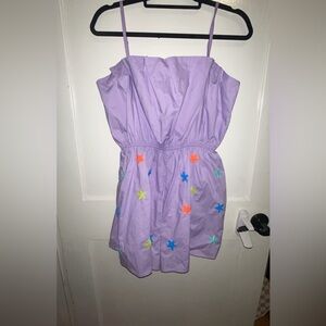 NWOT only tried on. Won’t fit my chest.  Super cute purple with sparkly stars.